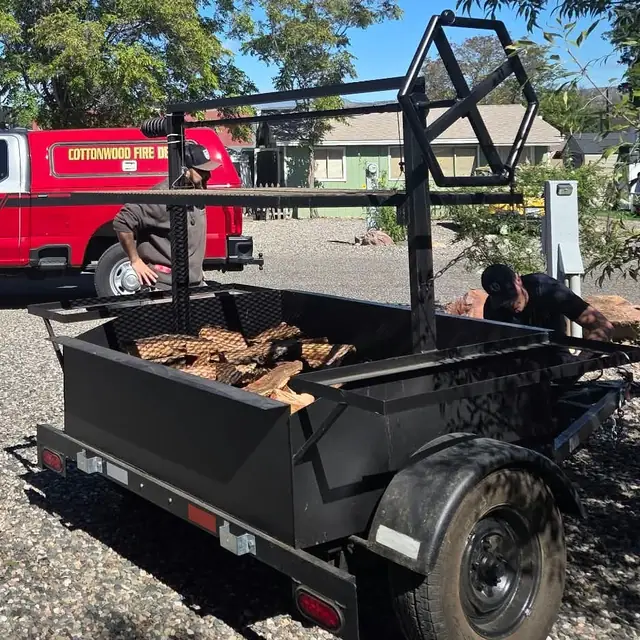 The Oak & Ember grill trailer during the fire inspection, with a Cottonwood Fire Department truck behind it